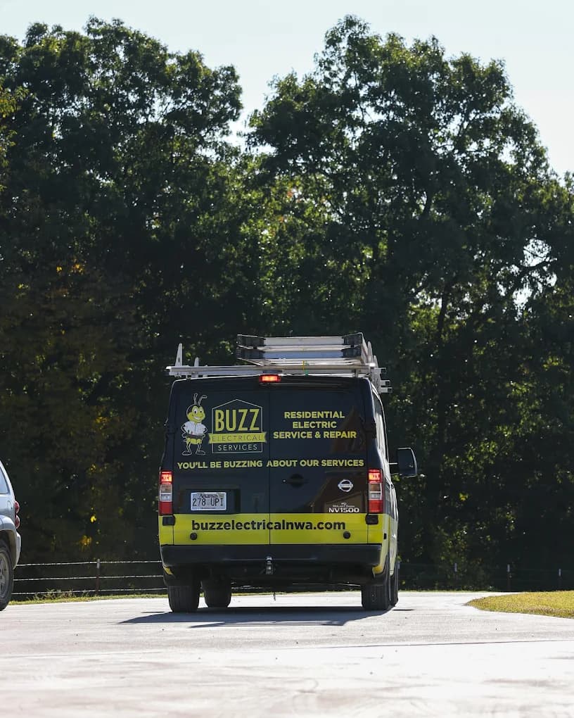 Branded Buzz Electrical service van on the road